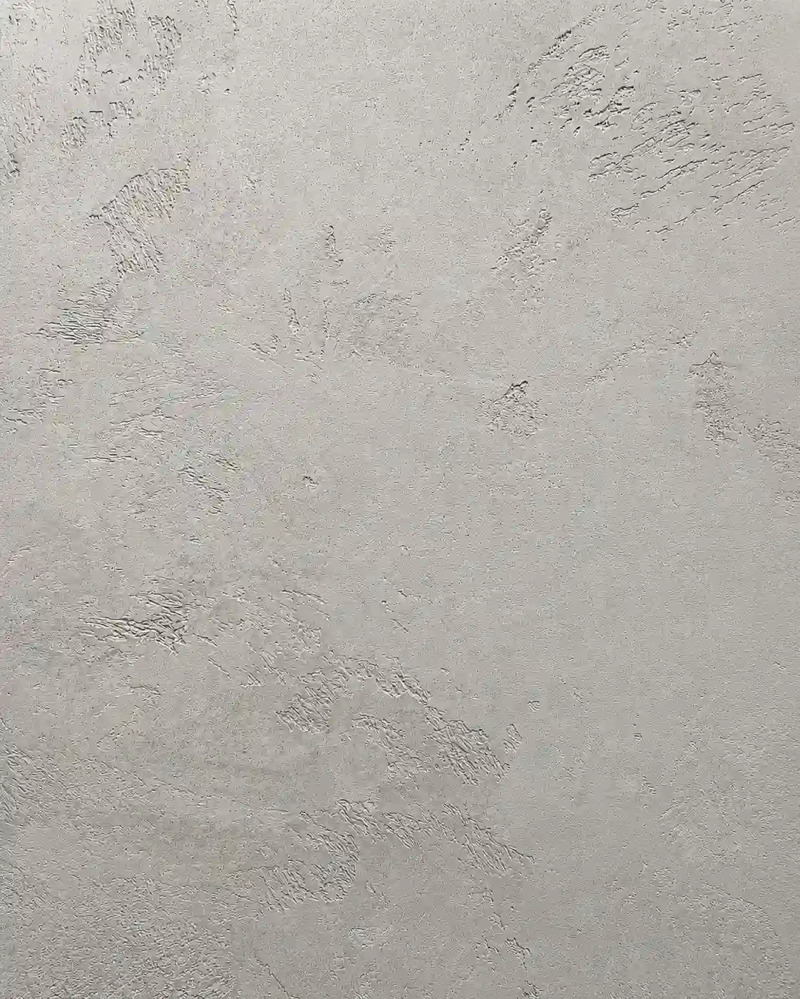 Marmorino Tintoretto sample in warm gray, showing a fine troweled mineral texture.