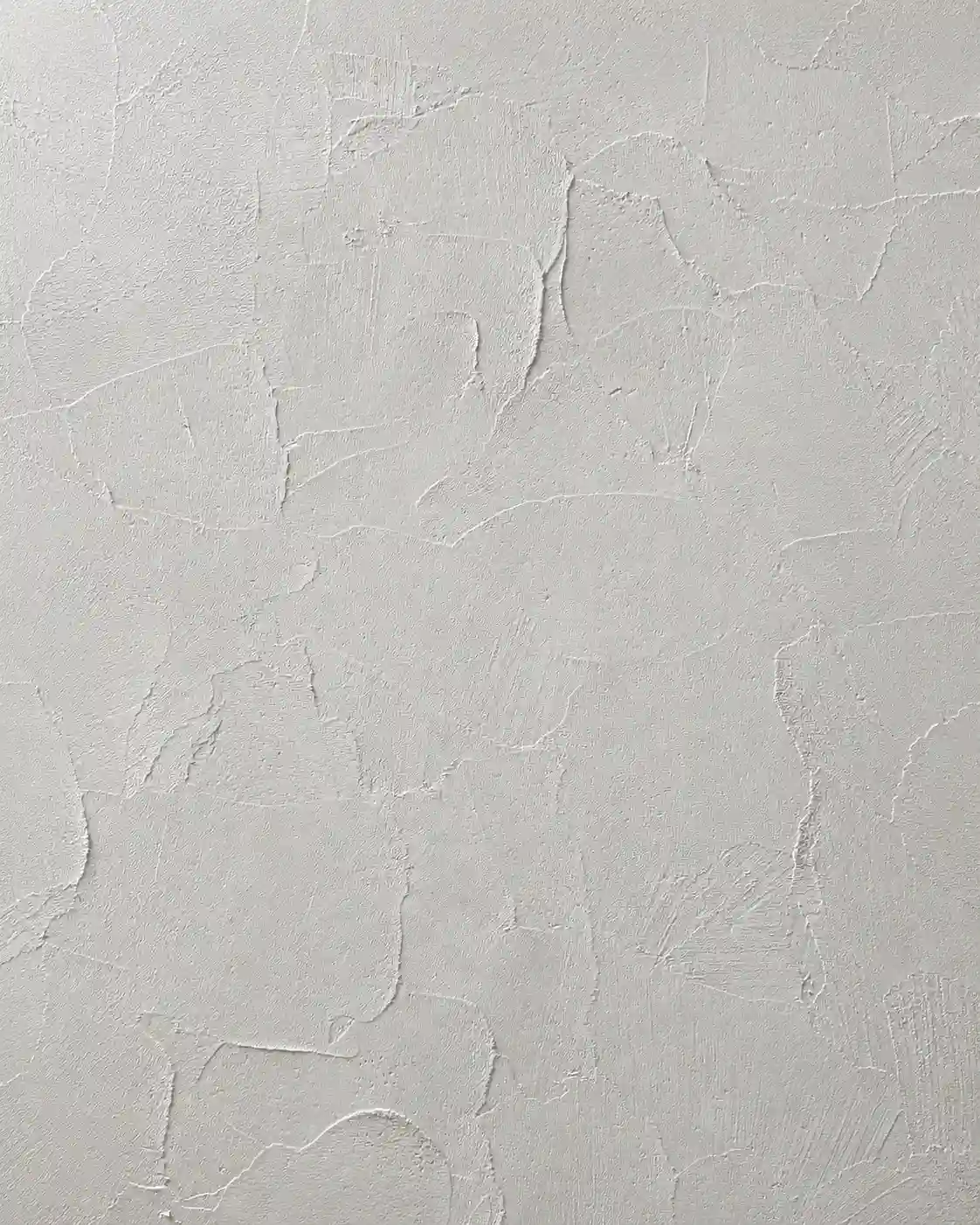 Marmorino Intonaco sample in light gray, with a hand-troweled, patched movement.