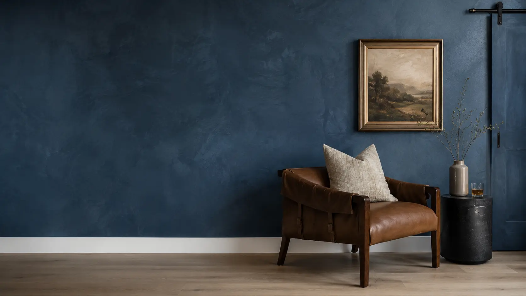 A soft, matte Roman clay wall in warm clay tone, showing the suede-like hand-applied surface in a calm interior.