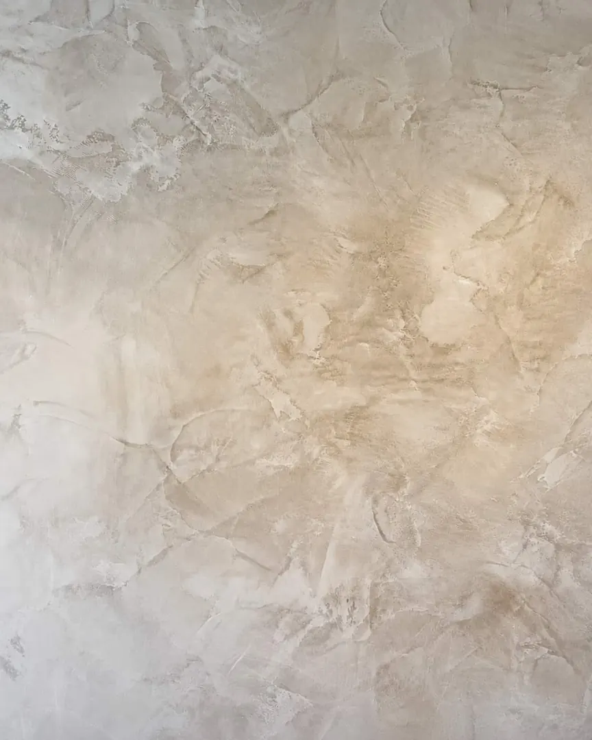 A suede-matte Roman clay wall texture in a warm cream tone.