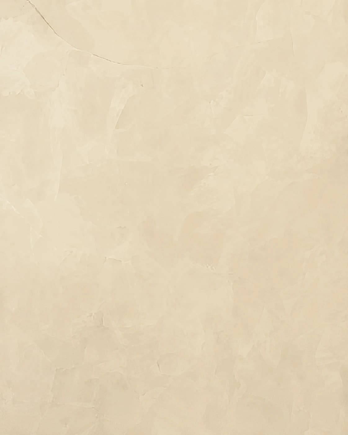 Close texture of a soft cream Moroccan clay surface with warm, organic movement - texture reference.
