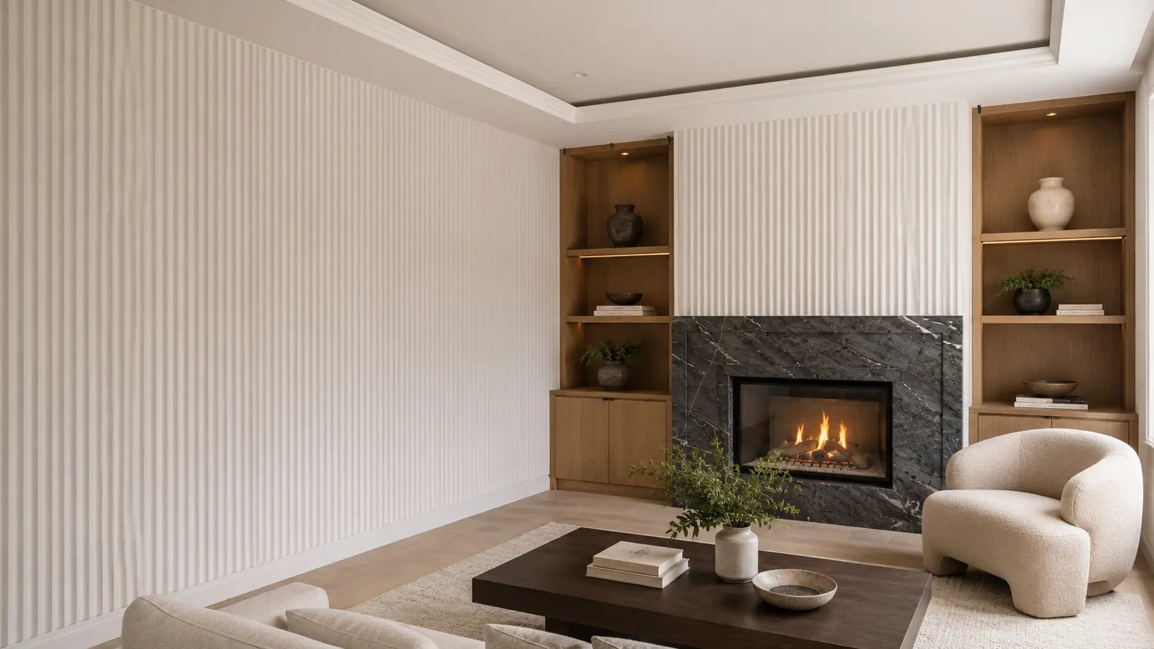 A sculptural fluted feature wall with vertical ridges catching soft light and shadow in a calm interior.