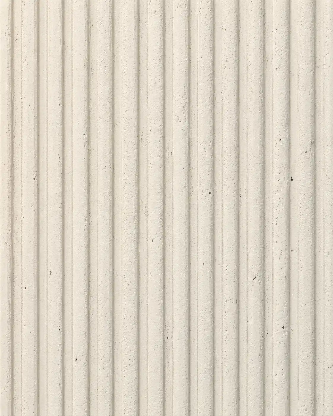 A fluted plaster texture with vertical hand-formed ribs.