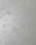 Metallic and pearl plaster texture sample in soft silver with a luminous, pearlescent sheen.