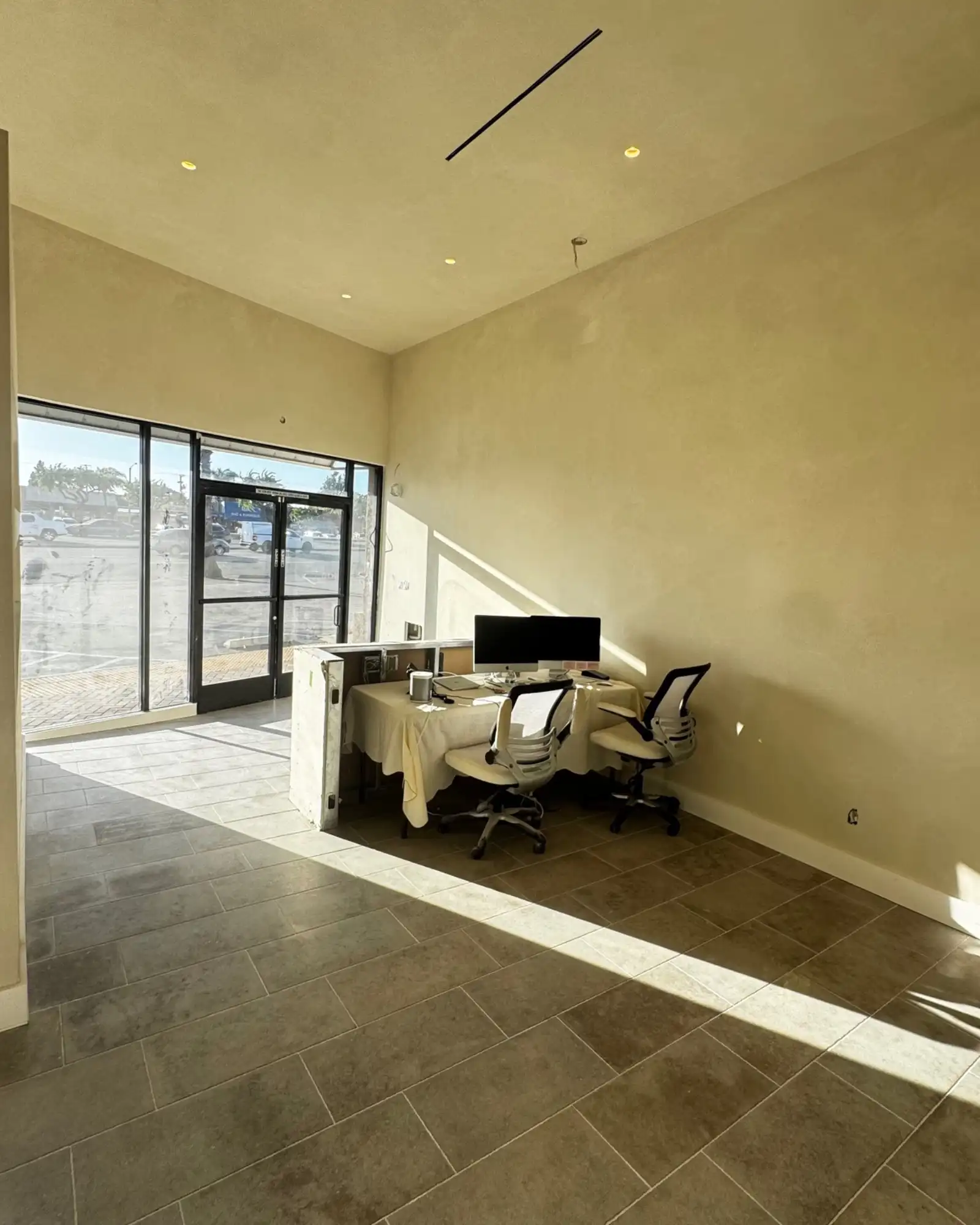 Lime wash walls in the entry and reception area of a Costa Mesa med spa.