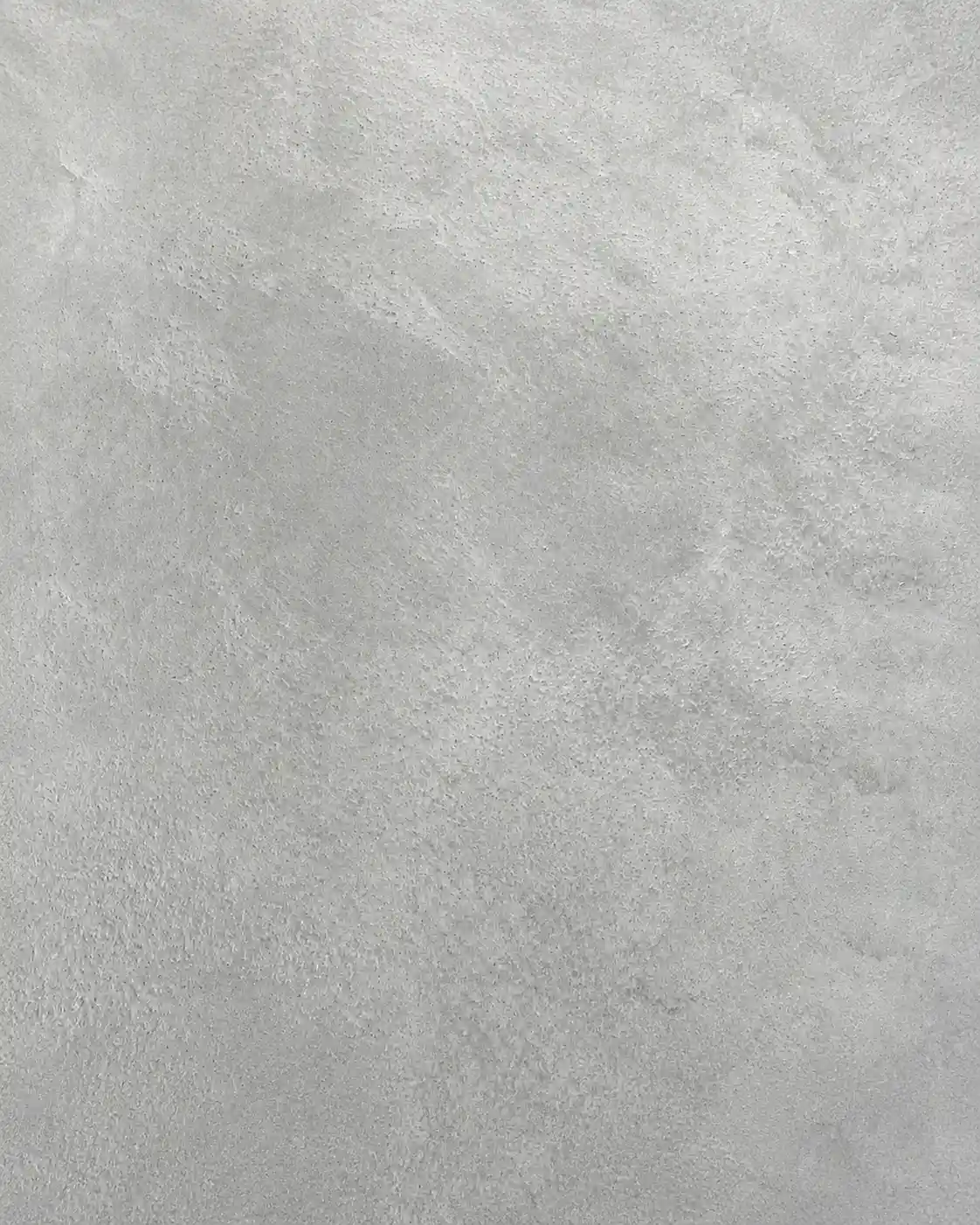 Close-up of a polished microcement surface texture