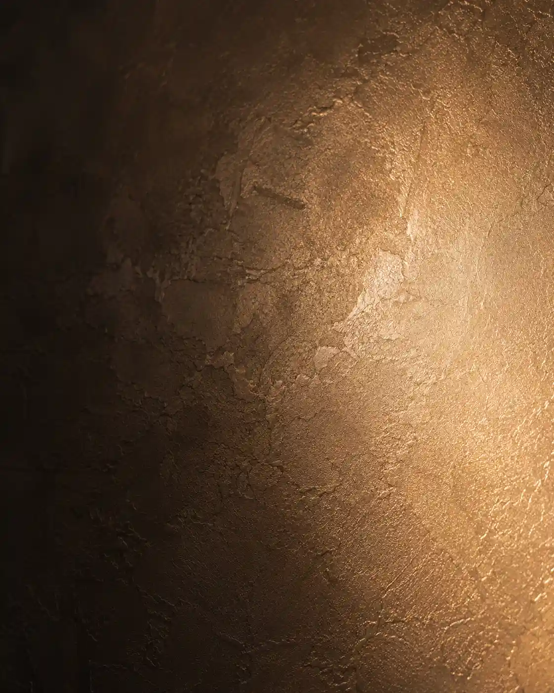 Close-up of a metallic pearl finish catching warm directional light