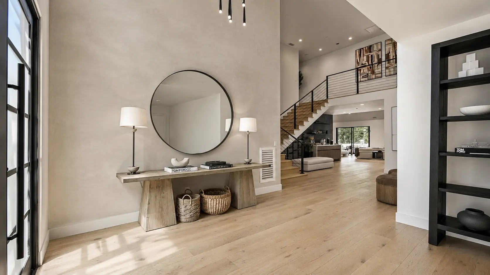 Roman clay entry walls - matte, velvety clay finish in a two-story foyer