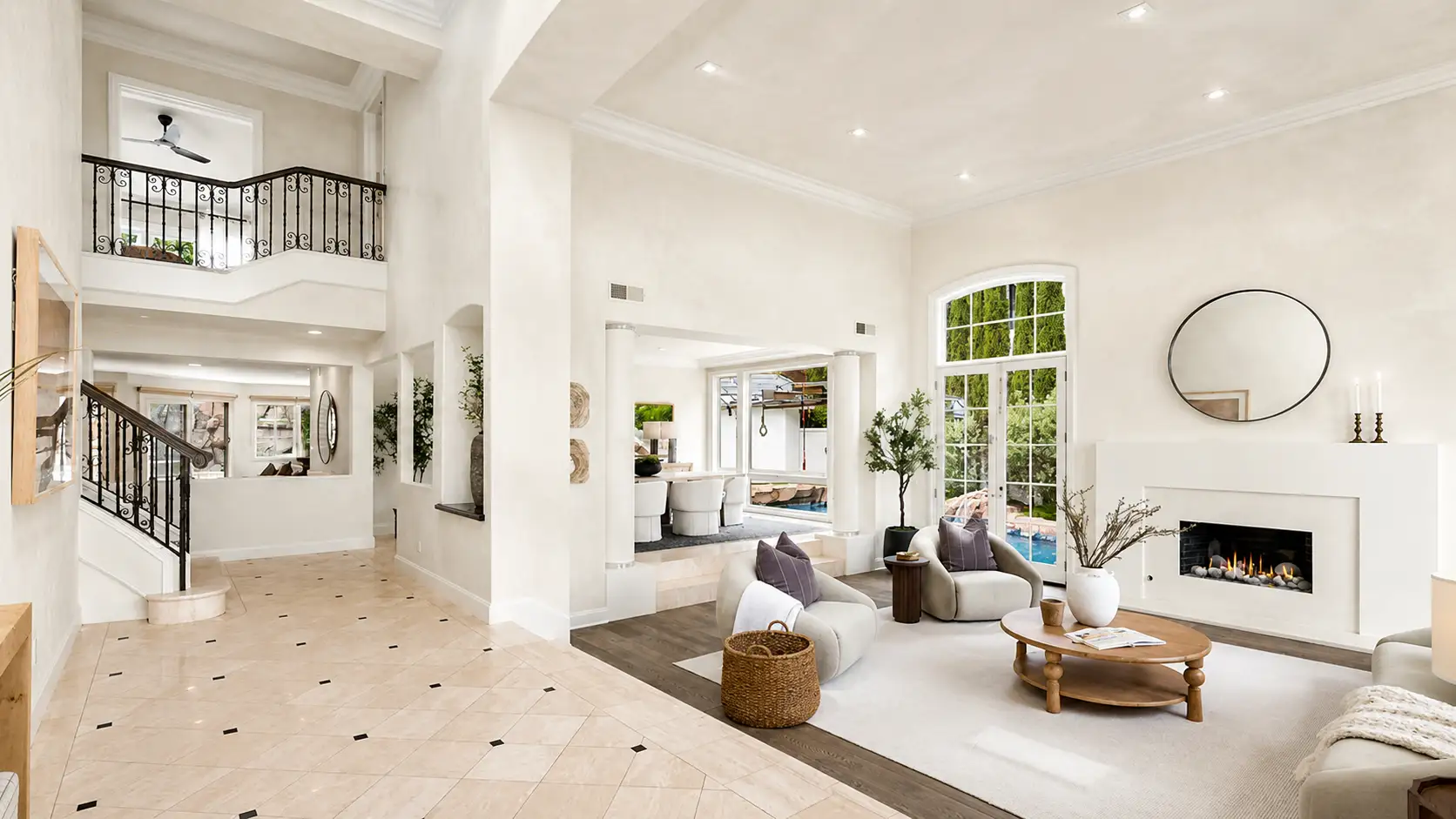 Pearl finish walls in a two-story foyer - luminous, light-reactive surface